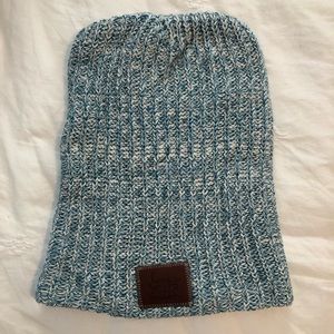 Love Your Melon beanie in teal and white